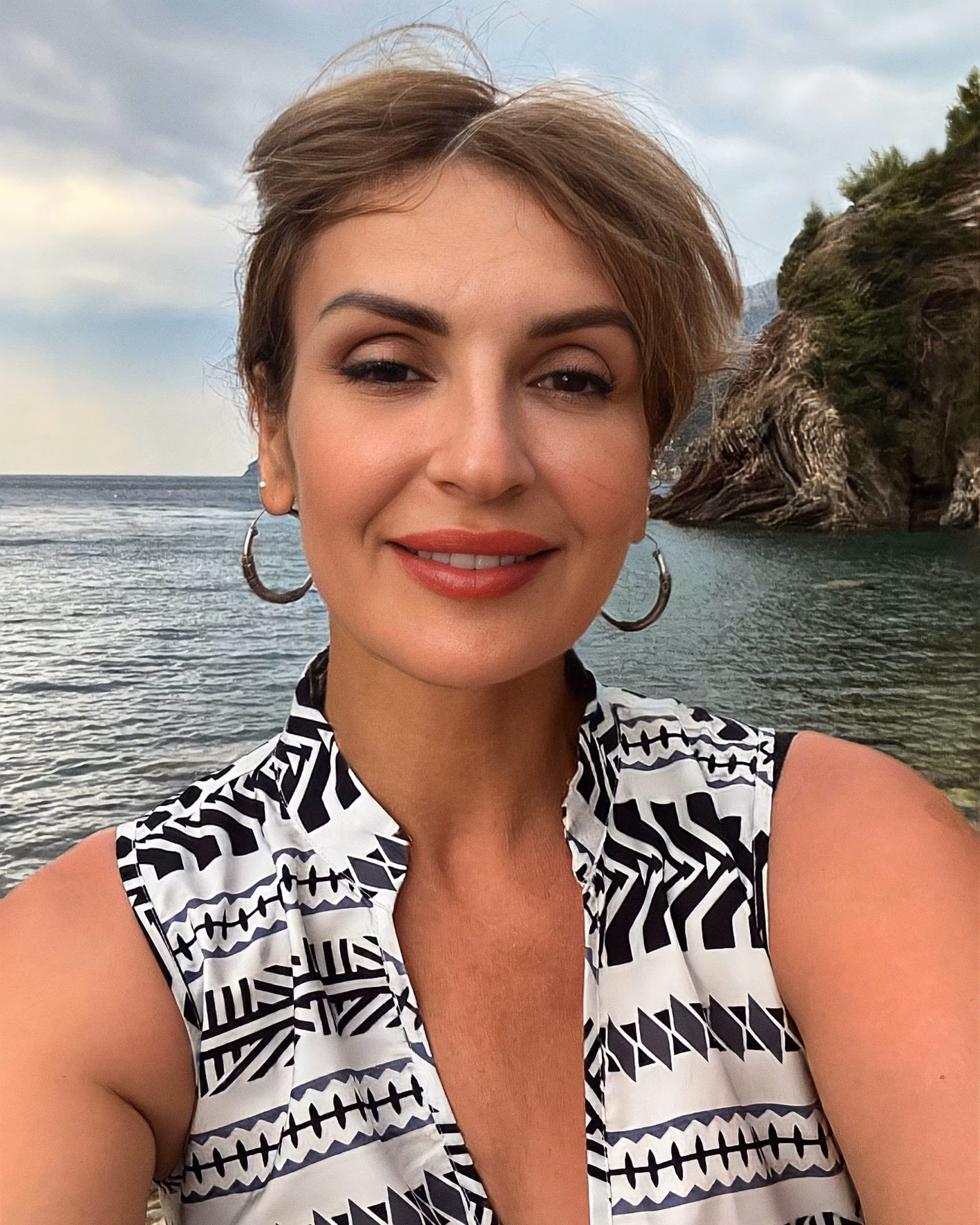 Open Woman's Profile
