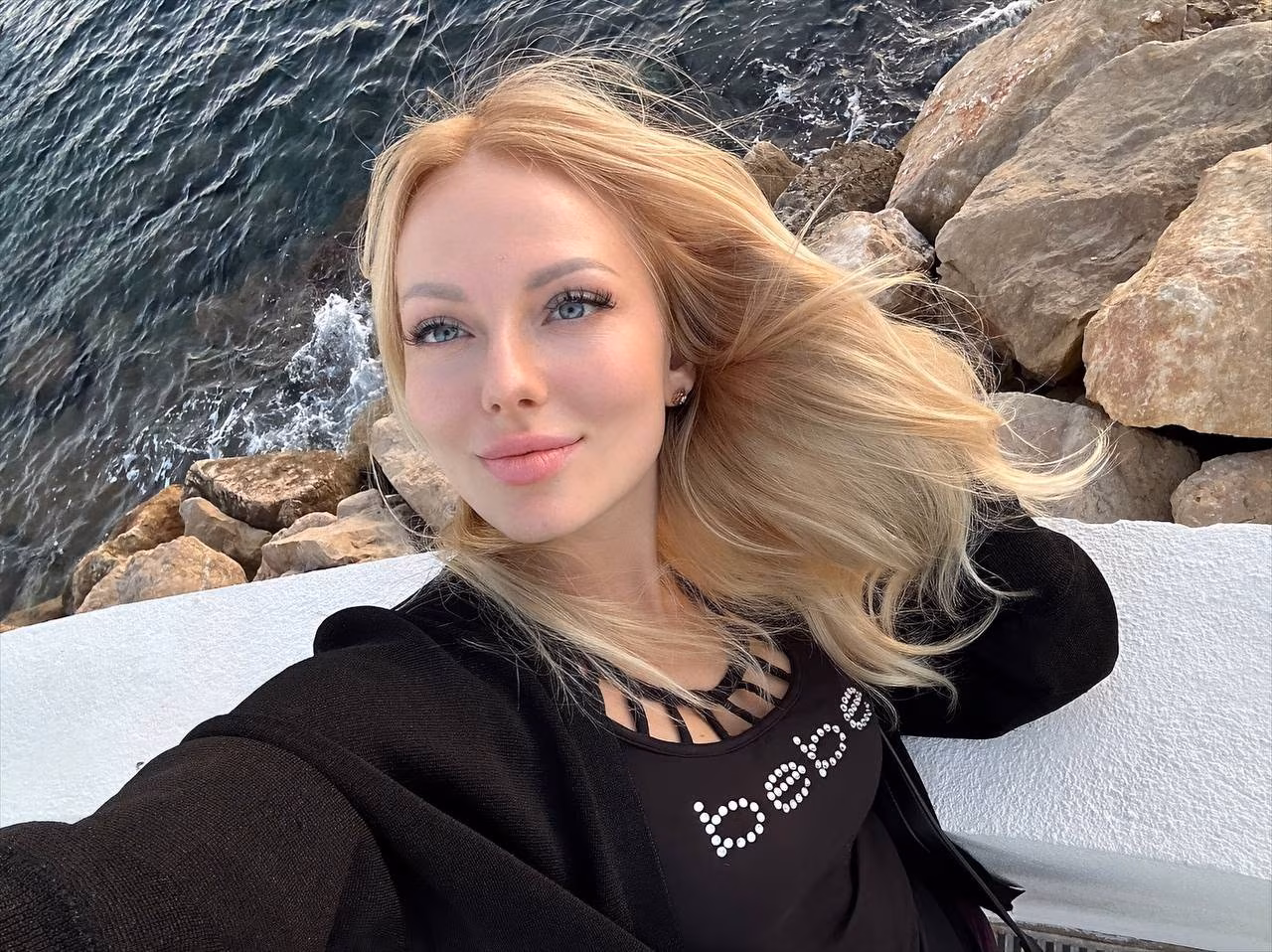 Open Woman's Profile